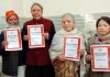 Scholars unveiling Sri Tantraloka discourse transcription in Kashmiri at Jammu on Saturday.