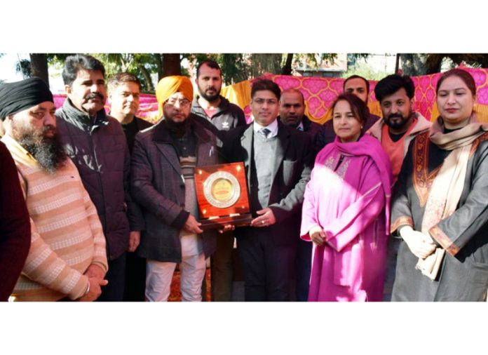 CEO of Diva Foundation being felicitated by DC & others during mega eye camp at Poonch.