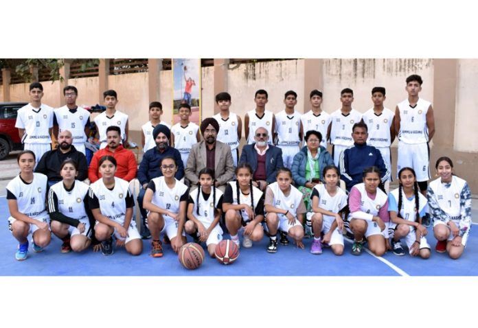 Basketball Sub-junior boys and girls teams posing along with dignitaries.