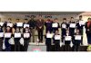 Students of APS Sunjuwan posing along with certificates and medals.