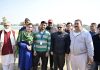 Chief Secretary Atal Dulloo and Nuzhat Gull, Secretary J&K Sports Council, posing with dignitaries and participants during the inauguration of Bharat Premier League in Jammu.