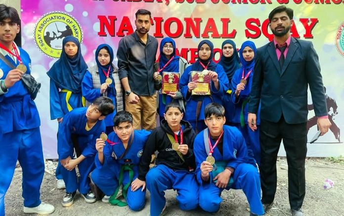 Jammu and Kashmir Sqay players posing along with medals during closing ceremony.
