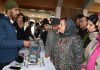 Minister Sakina Itoo interacting with students during a function in Srinagar.
