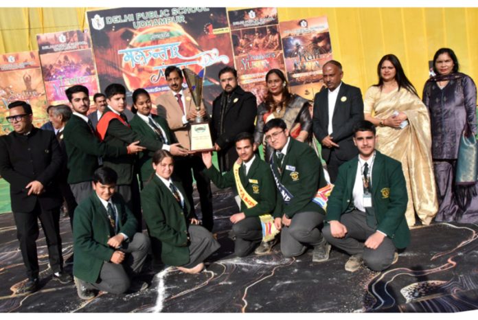 YS&S Minister Satish Sharma, MLA Udhampur-West, Pawan Kumar Gupta and students posing along with trophy during Annual Day event at DPS Udhampur. YS&S Minister Satish Sharma, MLA Udhampur-West, Pawan Kumar Gupta and students posing along with trophy during Annual Day event at DPS Udhampur.