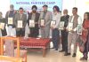 Artists posing with the Chief Guest during a camp organised in Jammu on Thursday.