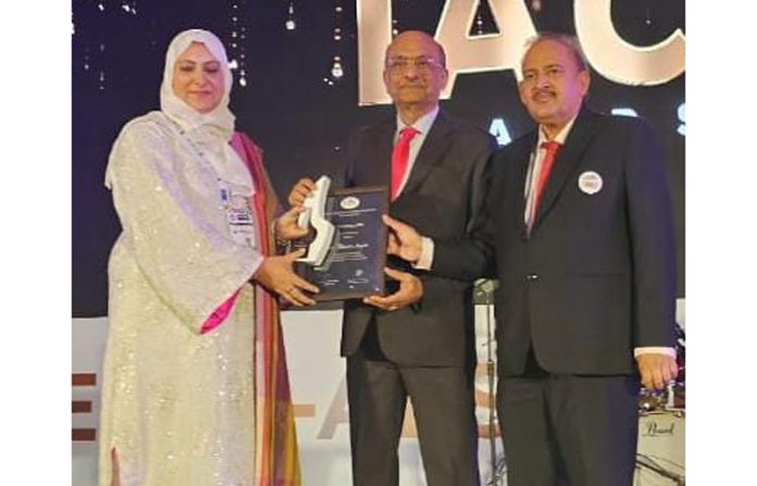 Dr Shamim Anjum from IGGDC, Jammu, receiving award from president, Dental Council of India, Dr Mazumdar during IACDE Conference in Mumbai. Dr Shamim Anjum from IGGDC, Jammu, receiving award from president, Dental Council of India, Dr Mazumdar during IACDE Conference in Mumbai.