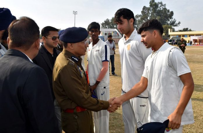 ADGP Jammu Zone Anand Jain interacting with players during a cricket tournament. ADGP Jammu Zone Anand Jain interacting with players during a cricket tournament.