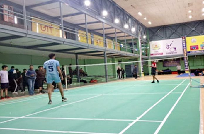Badminton players in action during a match at Jammu University. Badminton players in action during a match at Jammu University.
