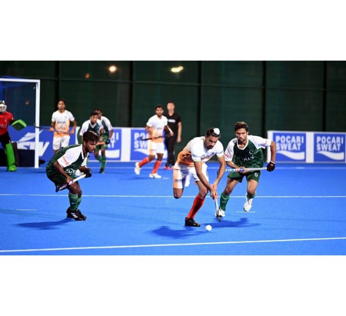 India and Pakistan junior hockey players in action during Asia Cup final match at Muscat on Wednesday. India and Pakistan junior hockey players in action during Asia Cup final match at Muscat on Wednesday.