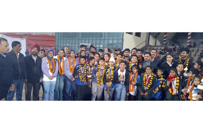 Roller Skating players posing with Minister Satish Sharma and Secretary JKSC Nuzhat Gul at MA Stadium Jammu after the felicitation ceremony.