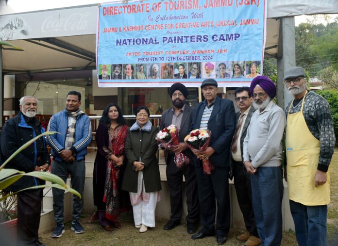 Organisers felicitating the artists during a camp organised in Jammu on Monday.