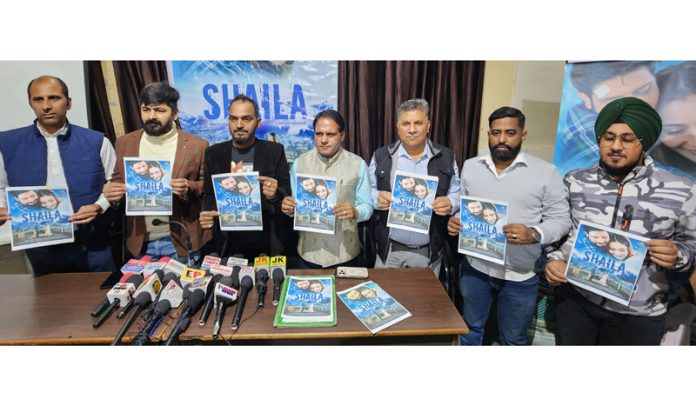 Sunil Sharma of Riyom Films along with others releasing poster of the film 'Shaila' at Jammu on Wednesday. —Excelsior/Rakesh