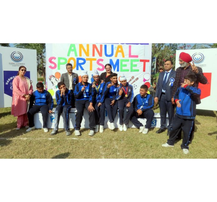 Students posing along with medals during Sports Day event on Friday. Students posing along with medals during Sports Day event on Friday.