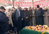 Dr Farooq Abdullah, CM Omar Abdullah and other NC leaders paying tribute to Sheikh Abdullah at Naseem Bagh, Srinagar on Thursday. -Excelsior/Shakeel