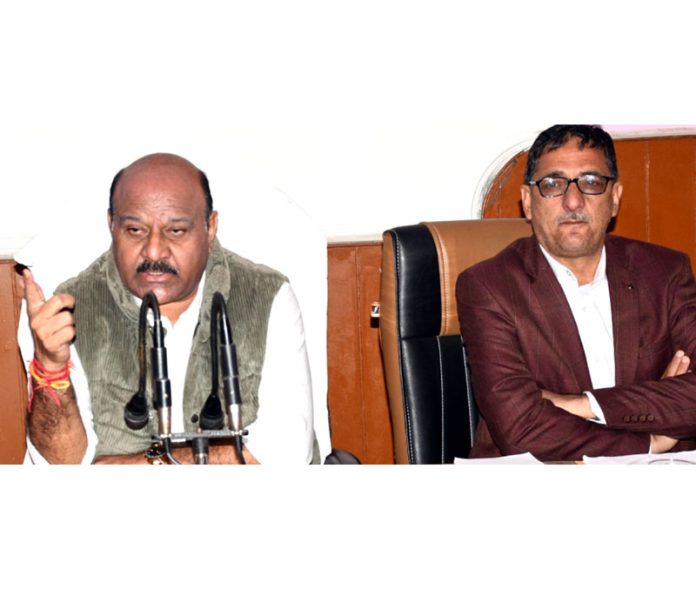 DyCM Surinder Kumar Choudhary chairing a review meeting of departments on Friday.