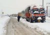 Trucks stranded on Jammu-Srinagar National Highway at Qazigund. -Excelsior/Sajad Dar