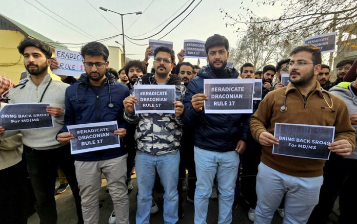 Doctors during a protest at GMC Srinagar on Monday. — Excelsior/Shakeel Doctors during a protest at GMC Srinagar on Monday. — Excelsior/Shakeel