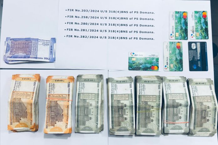 Cash and ATM cards seized from the accused cop. Cash and ATM cards seized from the accused cop.