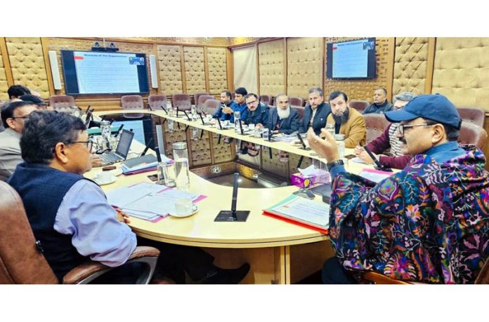 Minister Javed Ahmad Rana chairing a meeting.