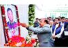DyCM Surinder Kumar Choudhary paying tribute to Madan Lal Sharma by offering flowers.
