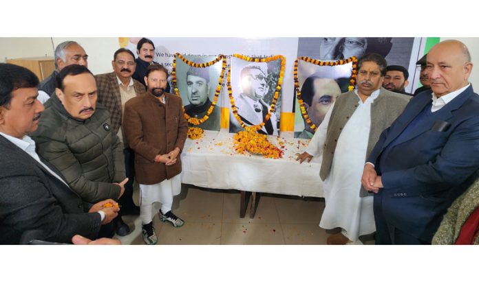 Senior Cong leaders paying tribute to GM Sadiq, Mir Qasim & Mir Lasjan in Jammu. - Excelsior/Rakesh Senior Cong leaders paying tribute to GM Sadiq, Mir Qasim & Mir Lasjan in Jammu. - Excelsior/Rakesh