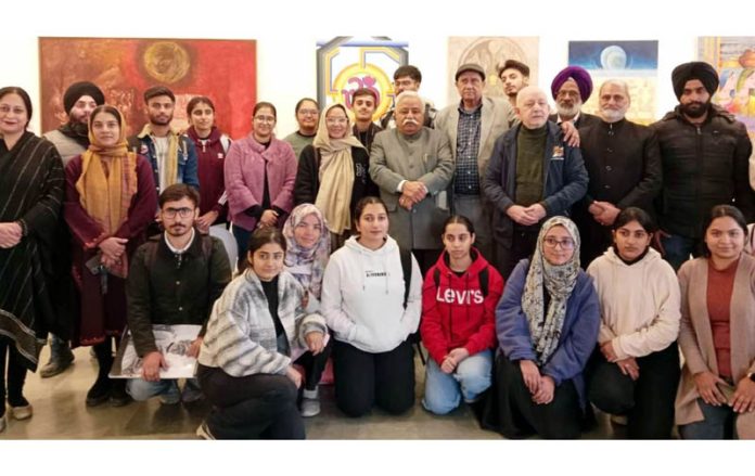 Former Minister Ajay Sadhotra alongwith artists and students of Institute of Music and Fine Arts at Kala Kendra Jammu.