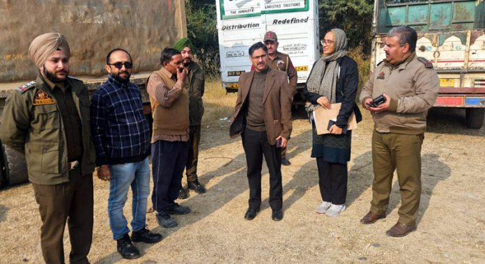 MVD officials during vehicle checking drive in Jammu on Friday.