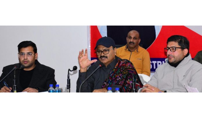 Minister Javed Rana chairing a meeting at Rajouri.