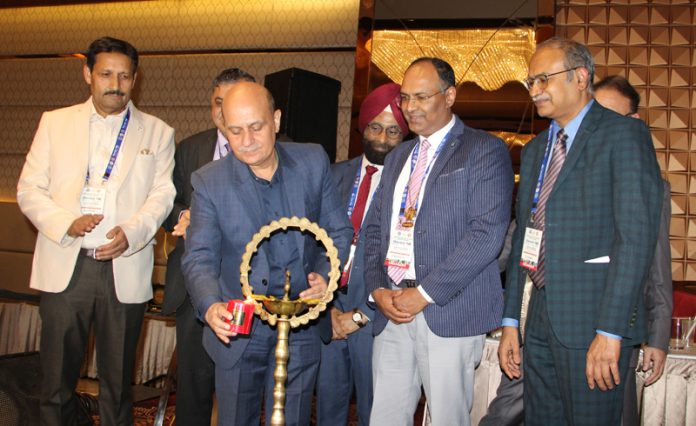 GMC Principal Dr Ashutosh Gupta lighting the traditional lamp to inaugurate thoracic CME at Radisson Blu Hotel in Jammu on Saturday. -Excelsior/Rakesh