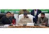 Minister Javed Ahmed Rana chairing a meeting at Mendhar on Friday.