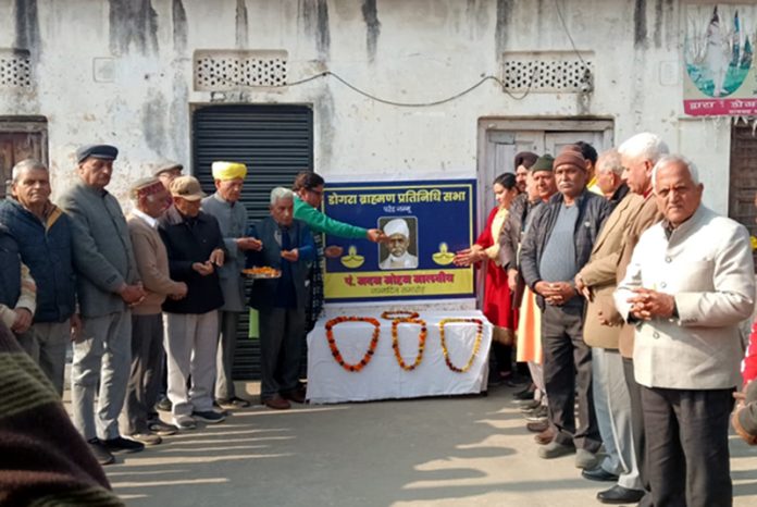 Members of Dogra Brahman Pratinidhi Sabha paying tribute to Pt. Madan Mohan Malaviya at Jammu on Wednesday. Members of Dogra Brahman Pratinidhi Sabha paying tribute to Pt. Madan Mohan Malaviya at Jammu on Wednesday.