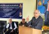 Retired IAS officer BR Kundal addressing a gathering during a program at Roop Nagar, Jammu.