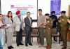 ADGP CID, Nitish Kumar presenting certificate to a participant of "Fast Food Stall Udyami" training program at the Police Drug De-addiction Center, Jammu.