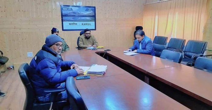 DC Kargil chairing a meeting.