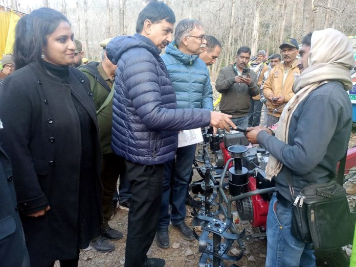 MLA Udhampur West Pawan Kumar Gupta interacting with farmers during awareness prog on Sunday.