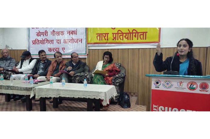A student speaking during Dogri Sur Sarvshreshta Tara Programme at Jammu on Sunday.