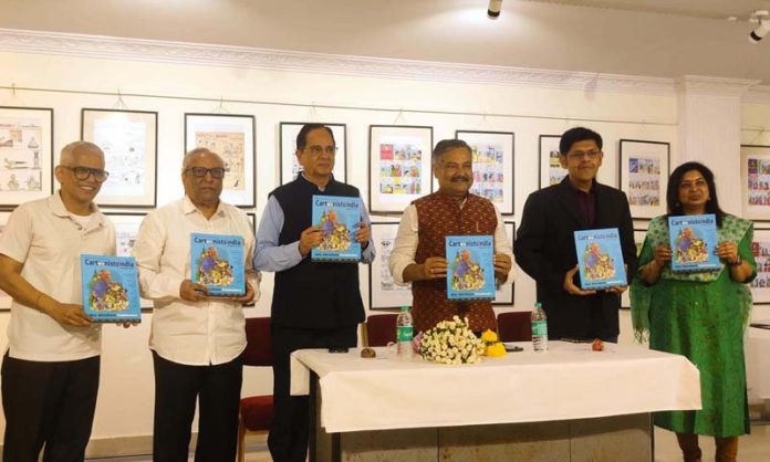 Dignitaries releasing edition of Cartoonists India Annual 2024, during the event.