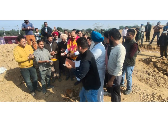 MLA Samba, Surjit Singh Slathia laying foundation stone of OHT at village Chak Medu in Samba district on Saturday.