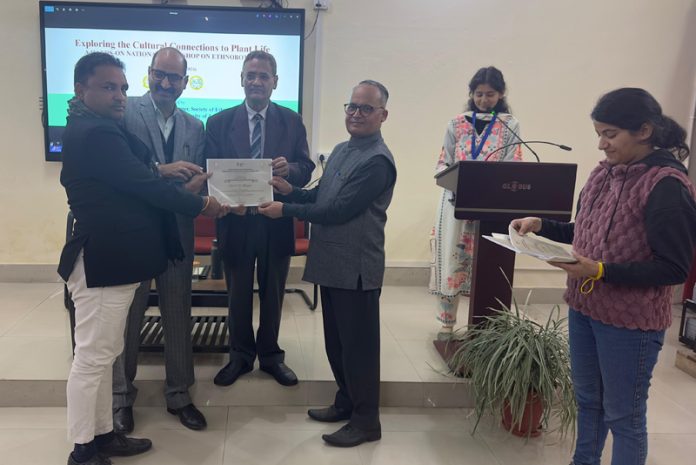 Participants of workshop being awarded certificates during valedictory function of three-day workshop.