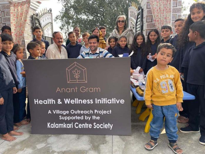 Purnima Chaudhri posing along with others during a function organised in Jammu on Sunday.