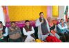 BJP president, Sat Sharma addressing a meeting at village Jaswan in Marh Assembly segment on Friday.
