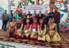 Rakesh Magotra, Project Director Samagra Shiksha posing along with the students during a function organised in Jammu on Wednesday.