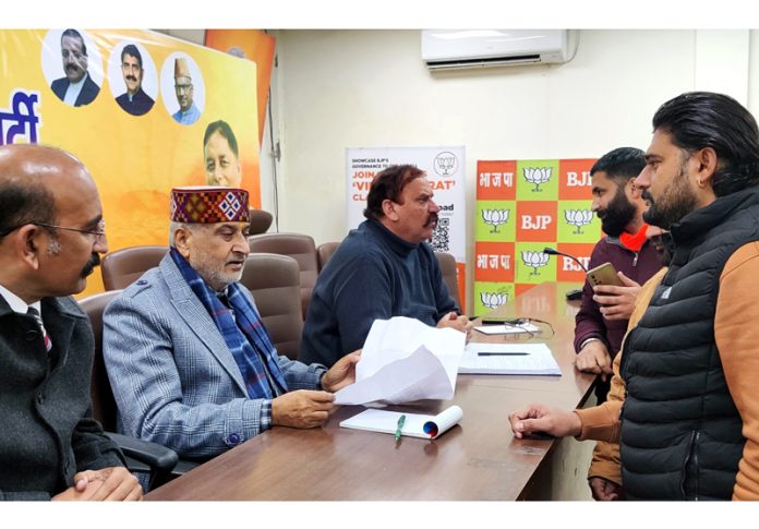 BJP MLAs, Sham Lal Sharma and Mohan Lal Bhagat holding a public darbar at party office, Jammu on Monday. BJP MLAs, Sham Lal Sharma and Mohan Lal Bhagat holding a public darbar at party office, Jammu on Monday.
