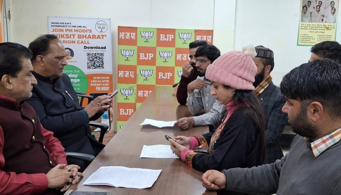 BJP leaders listening public grievances at party office Jammu on Tuesday. BJP leaders listening public grievances at party office Jammu on Tuesday.