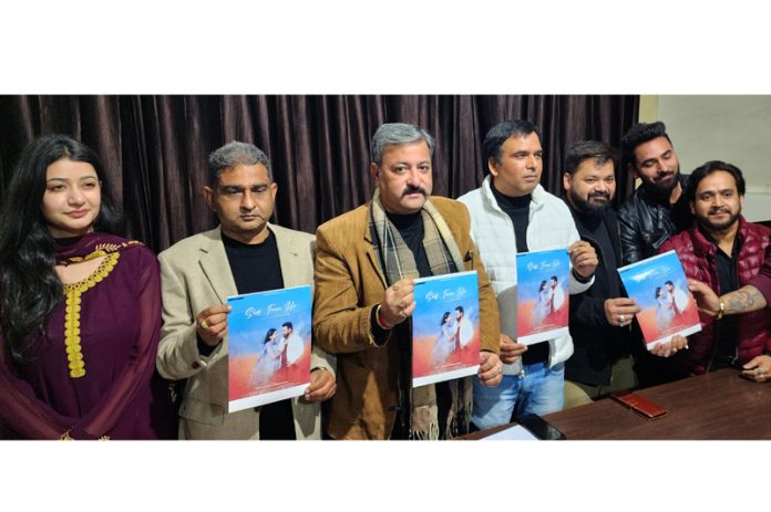 Anirudh Rai, DEO Udhampur and Zorawar Singh Jamwal releasing a video album in Jammu on Wednesday. — Excelsior/Rakesh