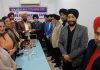 Congress leader Taranjit Singh Tony posing along with members of NGO in Jammu on Tuesday.