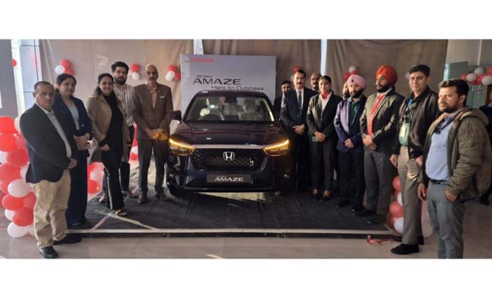 Ravish Trehan, MD of Hillview Honda launching 3rd Generation Honda Amaze in Jammu on Wednesday.