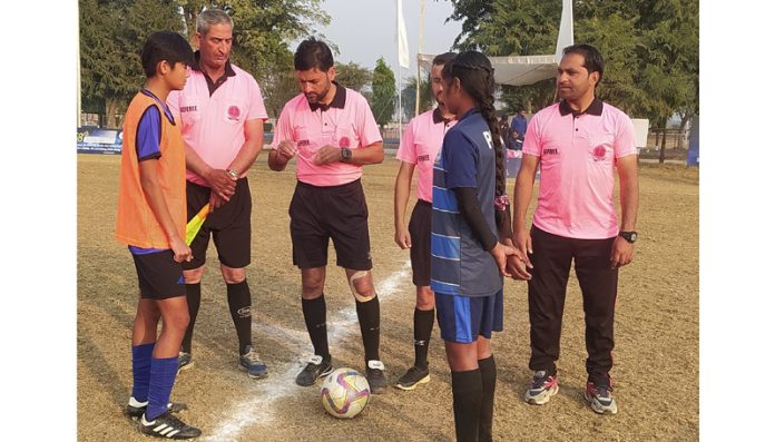 Captains of football teams along with referees before a match at Sainik School Nagrota.