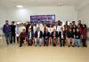 Doctors and nursing staff posing with guests during Neonatal Resuscitation Programme at ASCOMS Jammu.