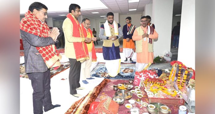 CEO SMVD Shrine Board performing pooja at Shubhra Bhawan during inspection.